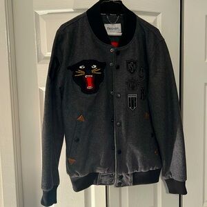 Medium Reason Varsity jacket. Charcoal Grey and Black with Panther print.